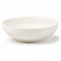 A white ceramic bowl with a subtle ribbed texture on the exterior, shown on a clean white background.